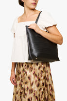 Medium Streamline Tote Storm on Model Shoulder