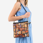 The Shag Tiki Tapa Mini Messenger being worn by a model