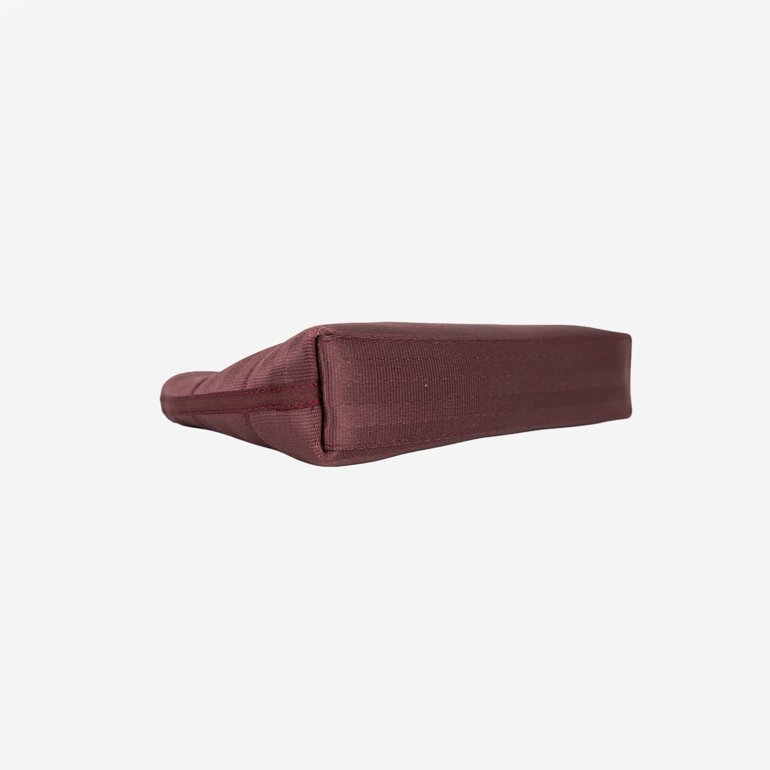 The bottom view of the Makeup Case in Merlot