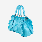 Side view of a Maliblue Lola Satchel