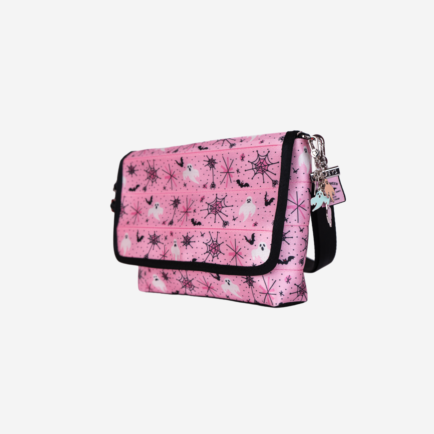 The side of a Medium Foldover Crossbody in Pink-A-Boo