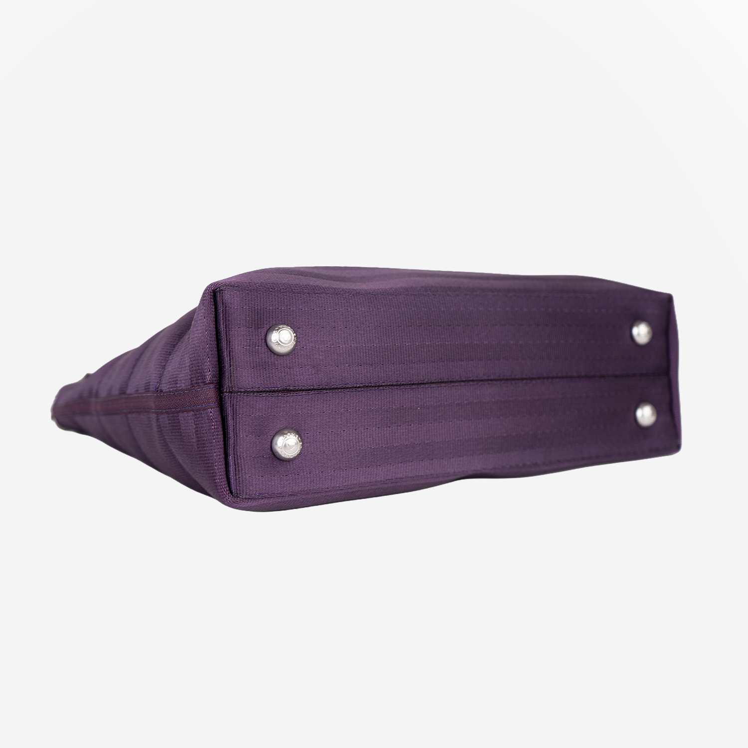 The bottom view of a Medium Streamline Tote in Blackberry