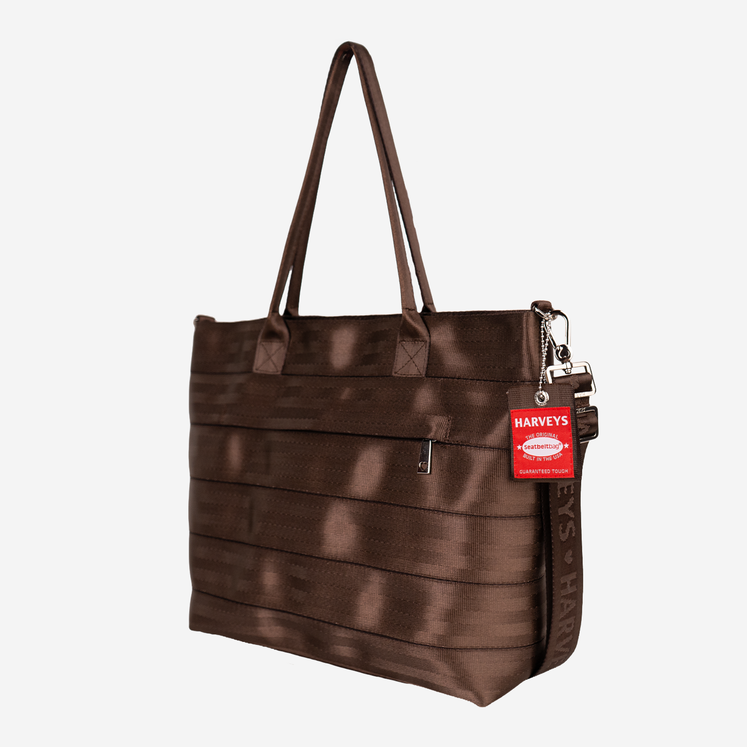 The side view of a Medium Streamline Tote in Espresso