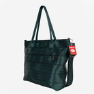 The side view of a Medium Streamline Tote in Nori