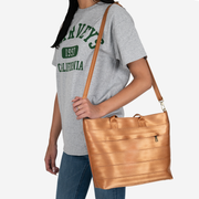 Medium Streamline Tote in the color Cognac with a crossbody strap