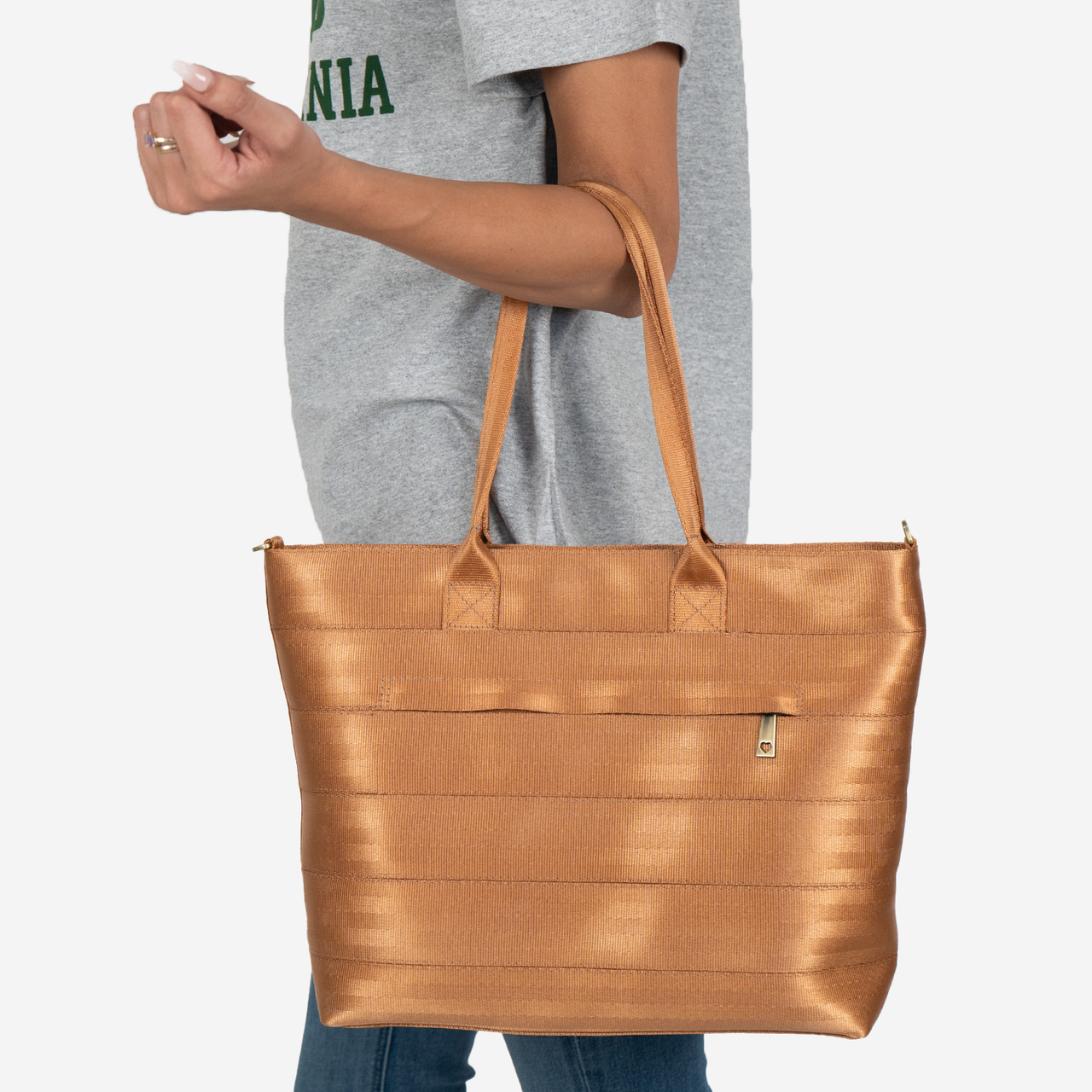 Medium Streamline Tote in the color Cognac on a models arm