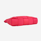 The bottom view of the Mini Messenger in Dragonfruit