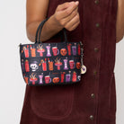 Model holding petite tote Shag Spooky Tiki Cocktail on arm