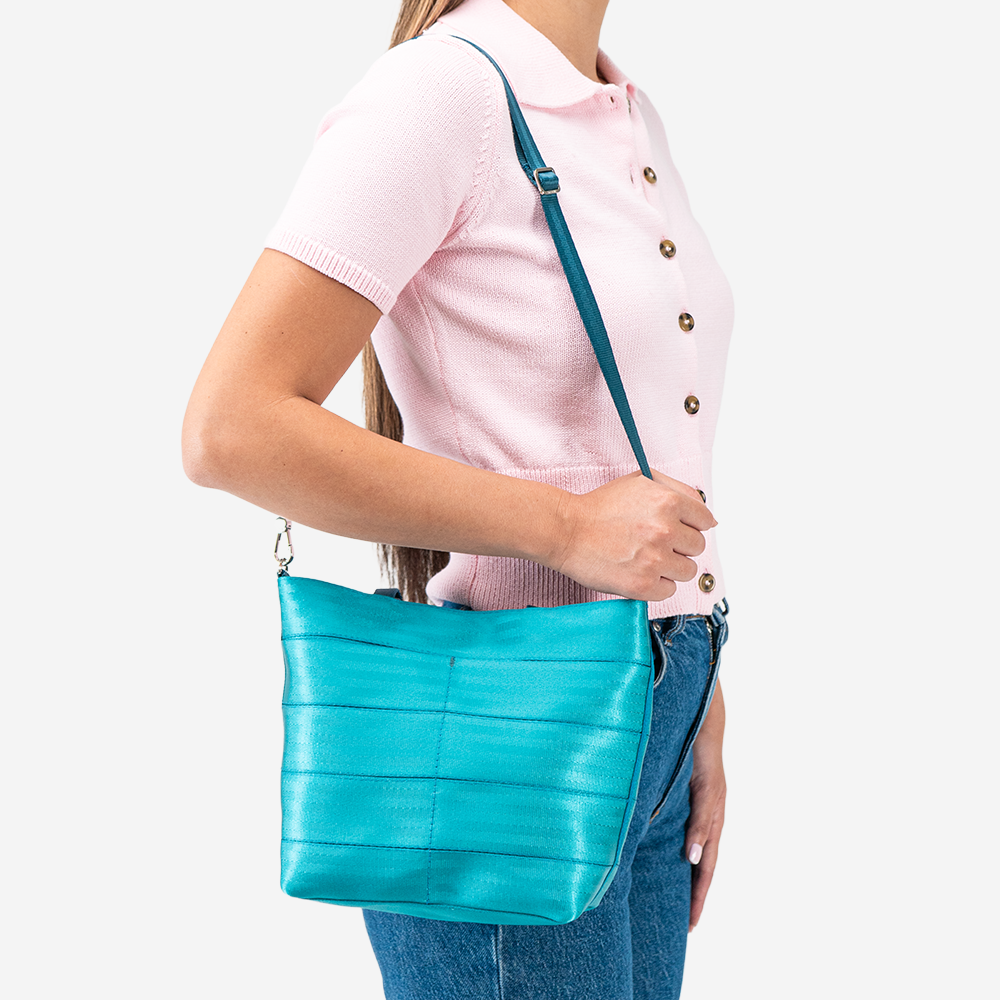 The Rosie Tote in Aqua being worn by a model