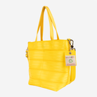 The side view of the Rosie Tote in Lemon