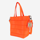 The side view of a Rosie Tote in Poppy