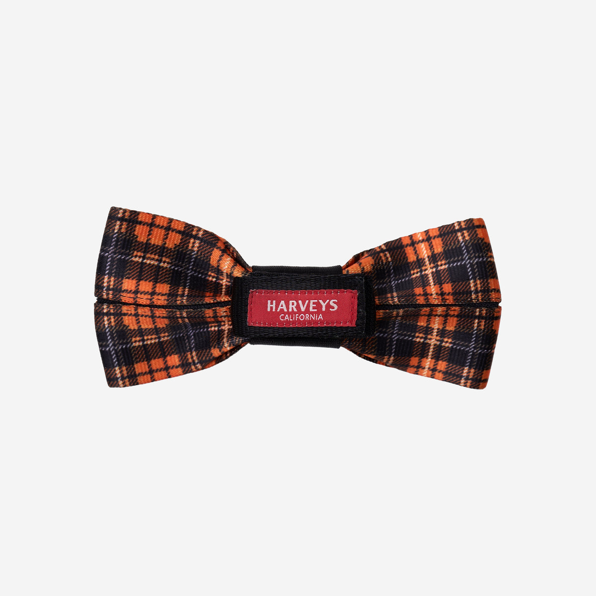Back view of seatbelt bow in orange tartan