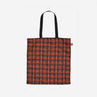 Front view of shopper tote in Orange Tartan
