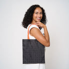 Model carrying small shopper tote in Punk'N