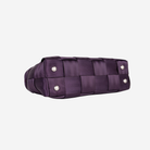 The bottom view of a Satchel in Blackberry