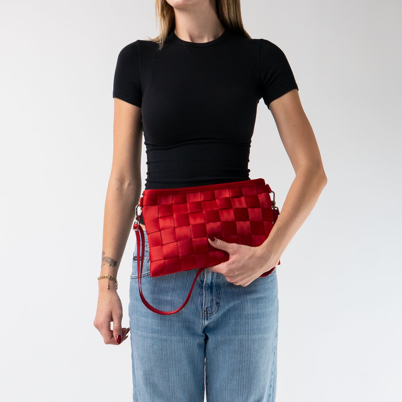 The Scarlet Large Hip Pack bing used by a model