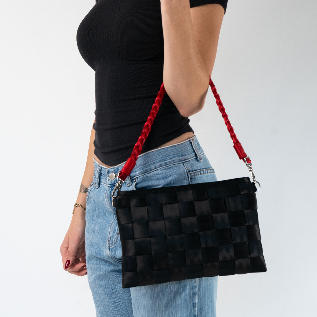 A Scarlet Sophia Click N Carry being used by a model