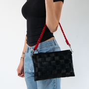 A Scarlet Sophia Click N Carry being used by a model