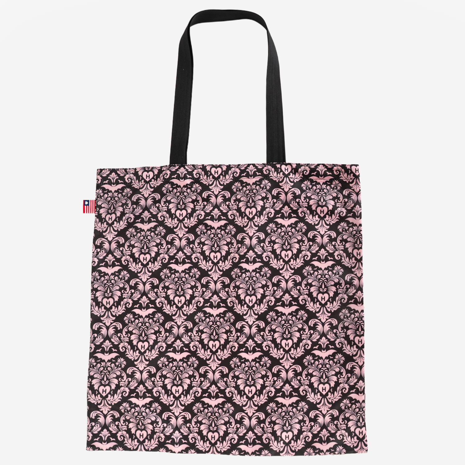 The front of a Shopper Tote in Pink Damask