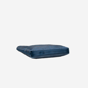 Bottom view of a Streamline Crossbody in Denim