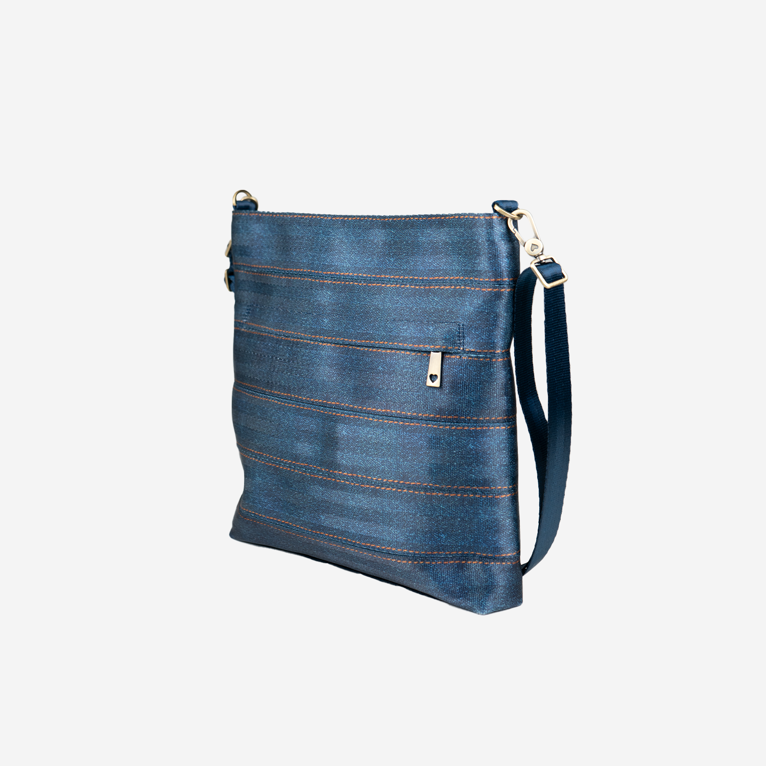 Side view of a Streamline Crossbody in Denim