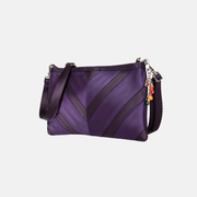 Side view of a Grape Soda Sydney Clutch