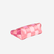 Bottom view of a Triangle Makeup Case in the colorway Cotton Candy + Fuchsia