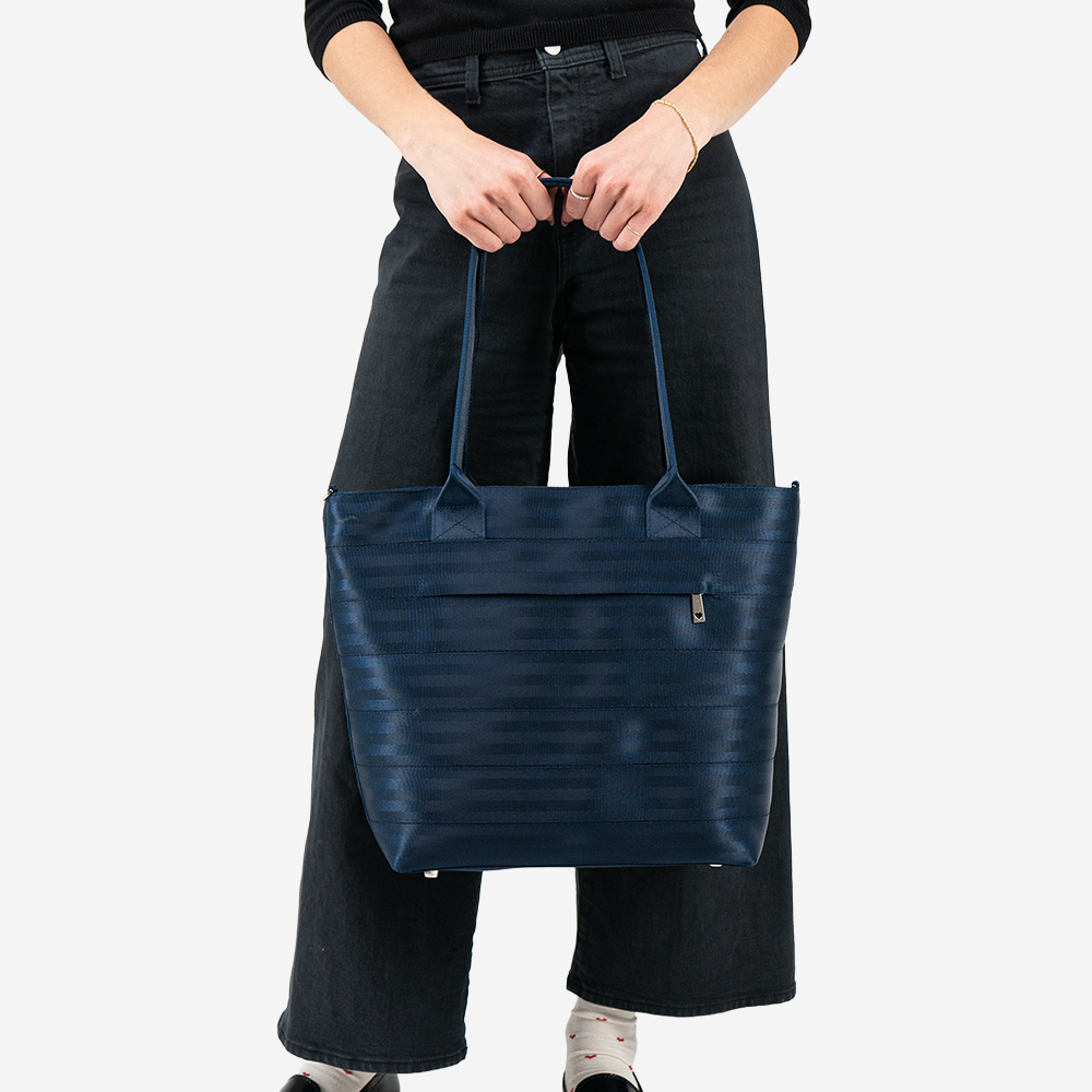 A Wanderlust in Indigo being held by a model