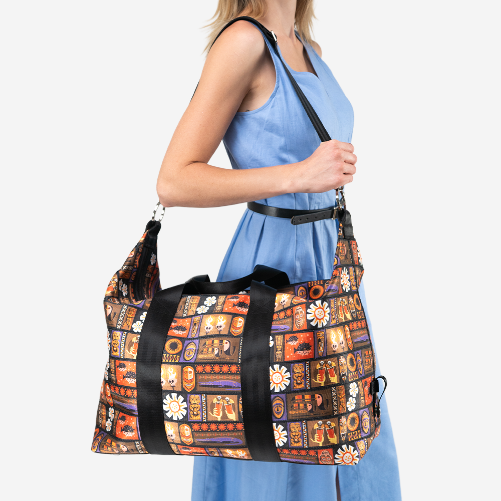 The Shag Tiki Tapa Weekender being worn by a model