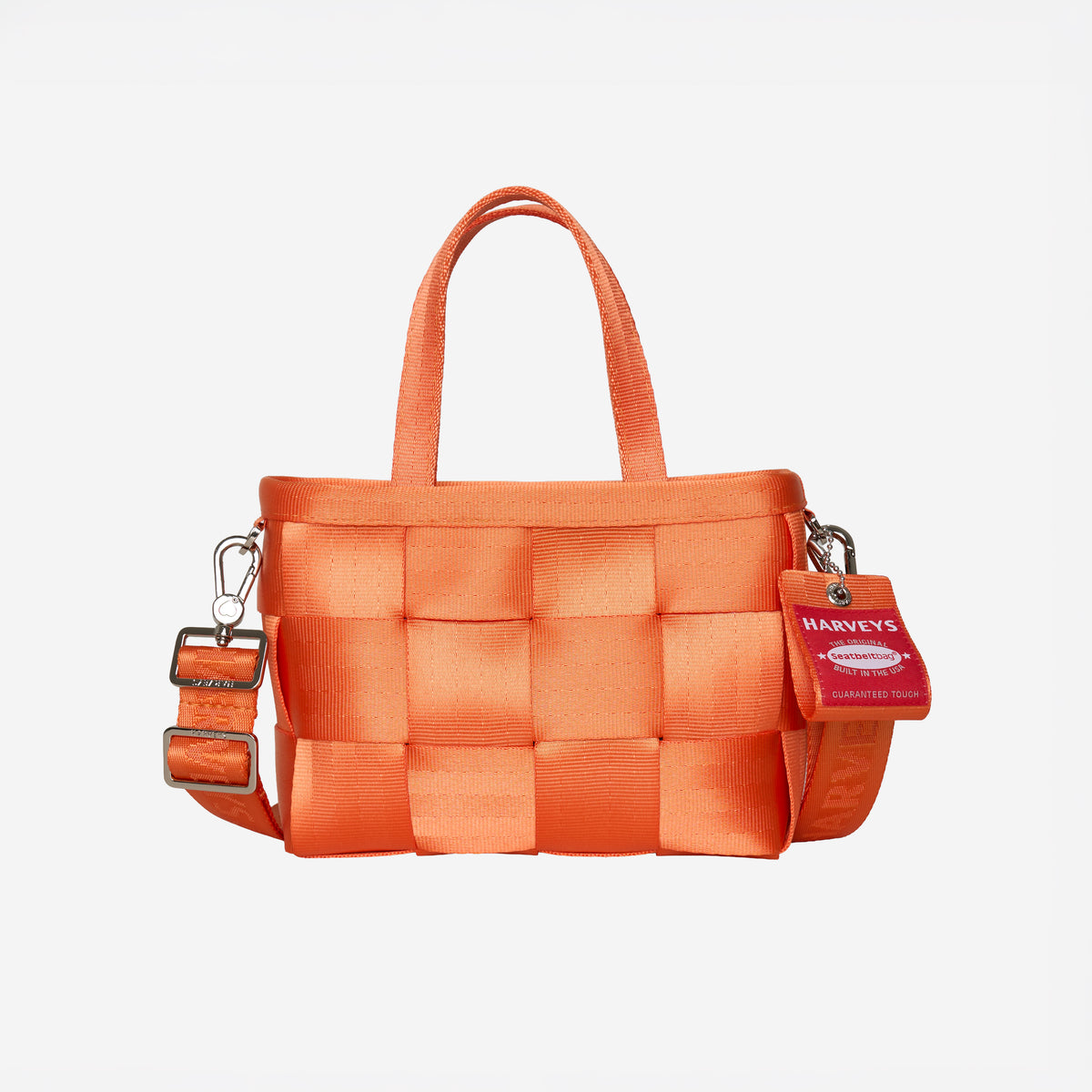 Front view of woven petite tote orange