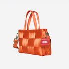 Front/side view of woven petite tote orange