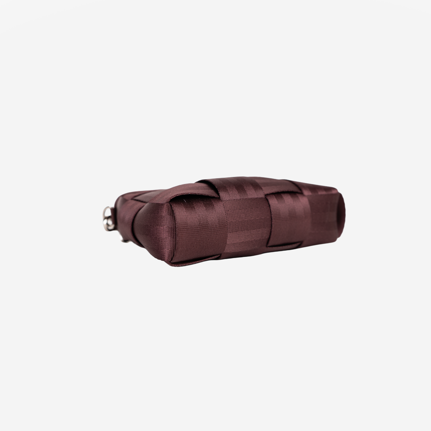 The bottom view of the Woven Petite Tote in Merlot