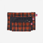 View of 3 sizes of Zip N' Go Pouches in orange tartan & skulls