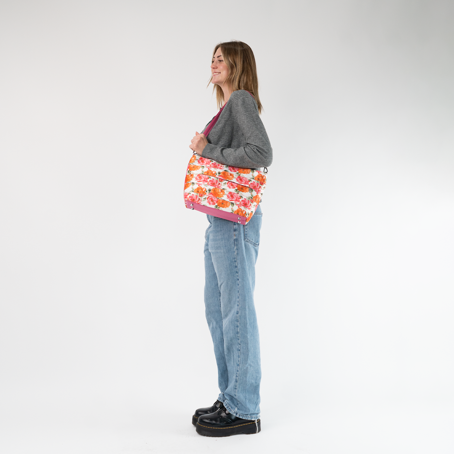 The Betty Rose Mini Streamline Tote being worn by a model