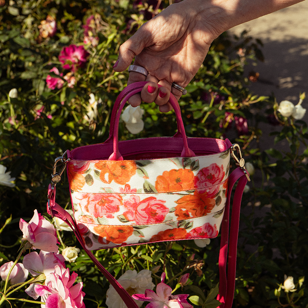 The Betty Rose Petite Tote being held in a model's hand