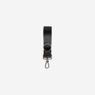 The front of a black 4 panel keychain
