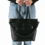 Black Sophia strap on a bag