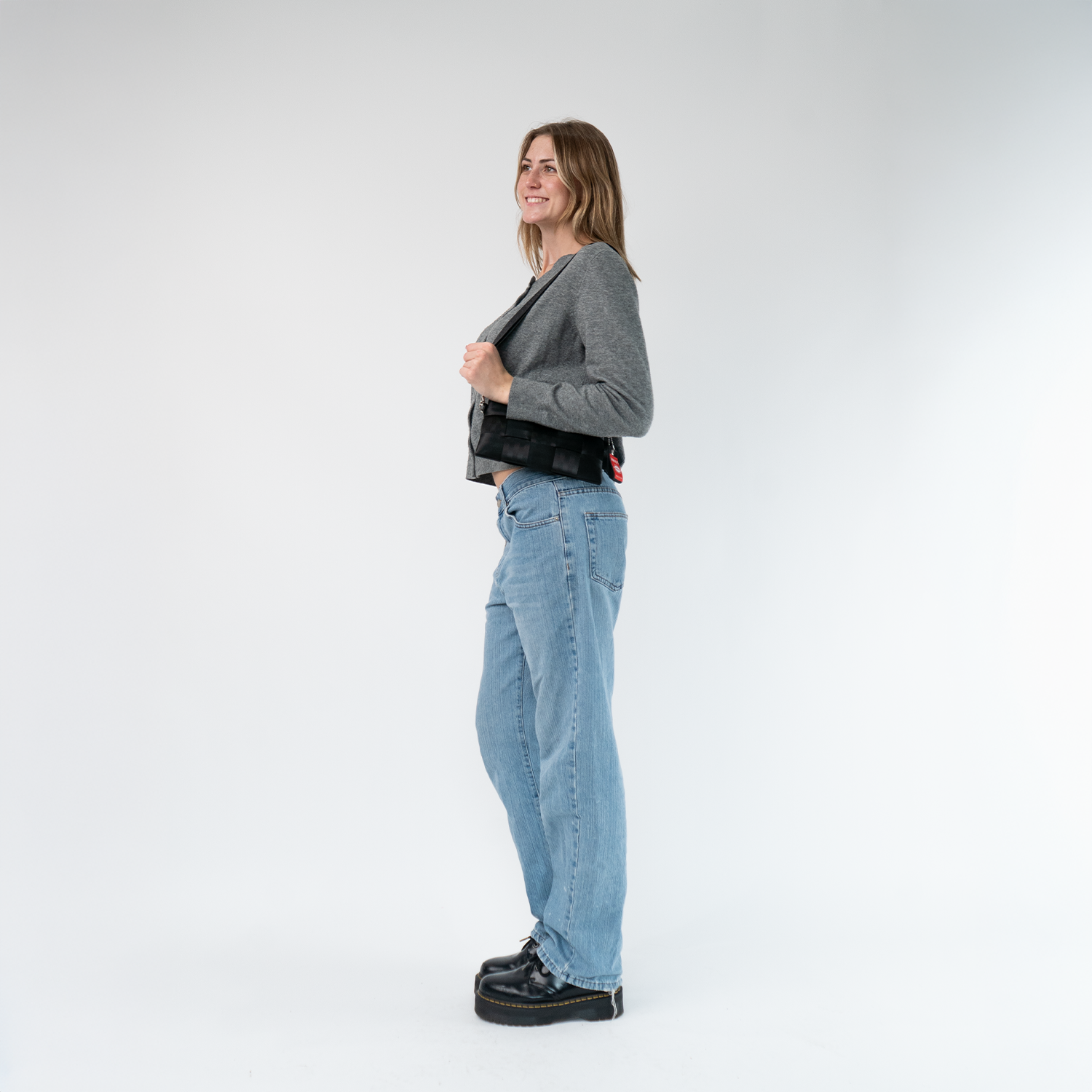 A Hip Pack in Black being worn by a Model