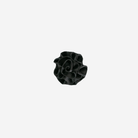 The front of a black rosette
