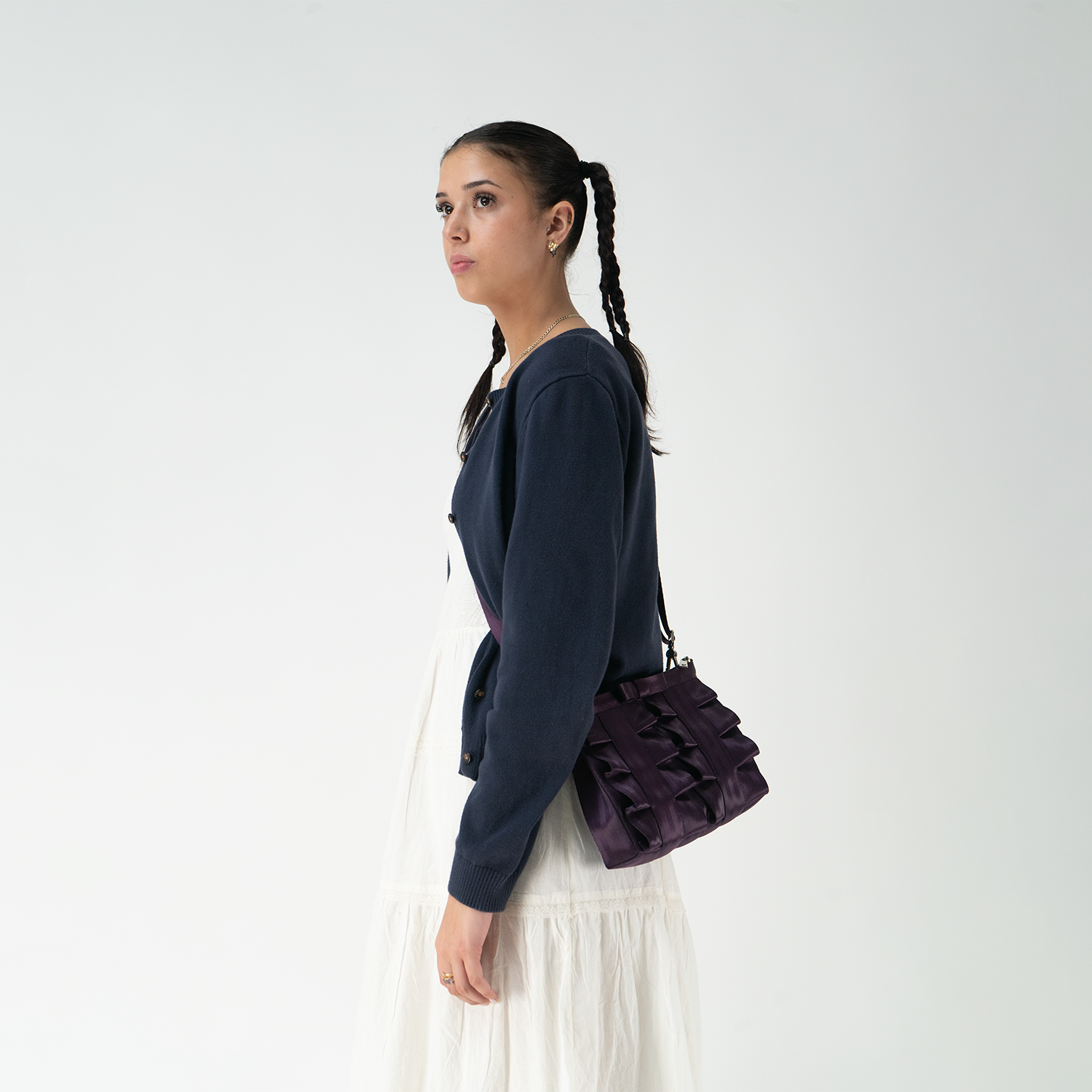 Blackberry Lola Bow Clutch being worn by a model