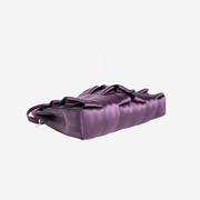 The bottom of a Blackberry Lola Bow Clutch