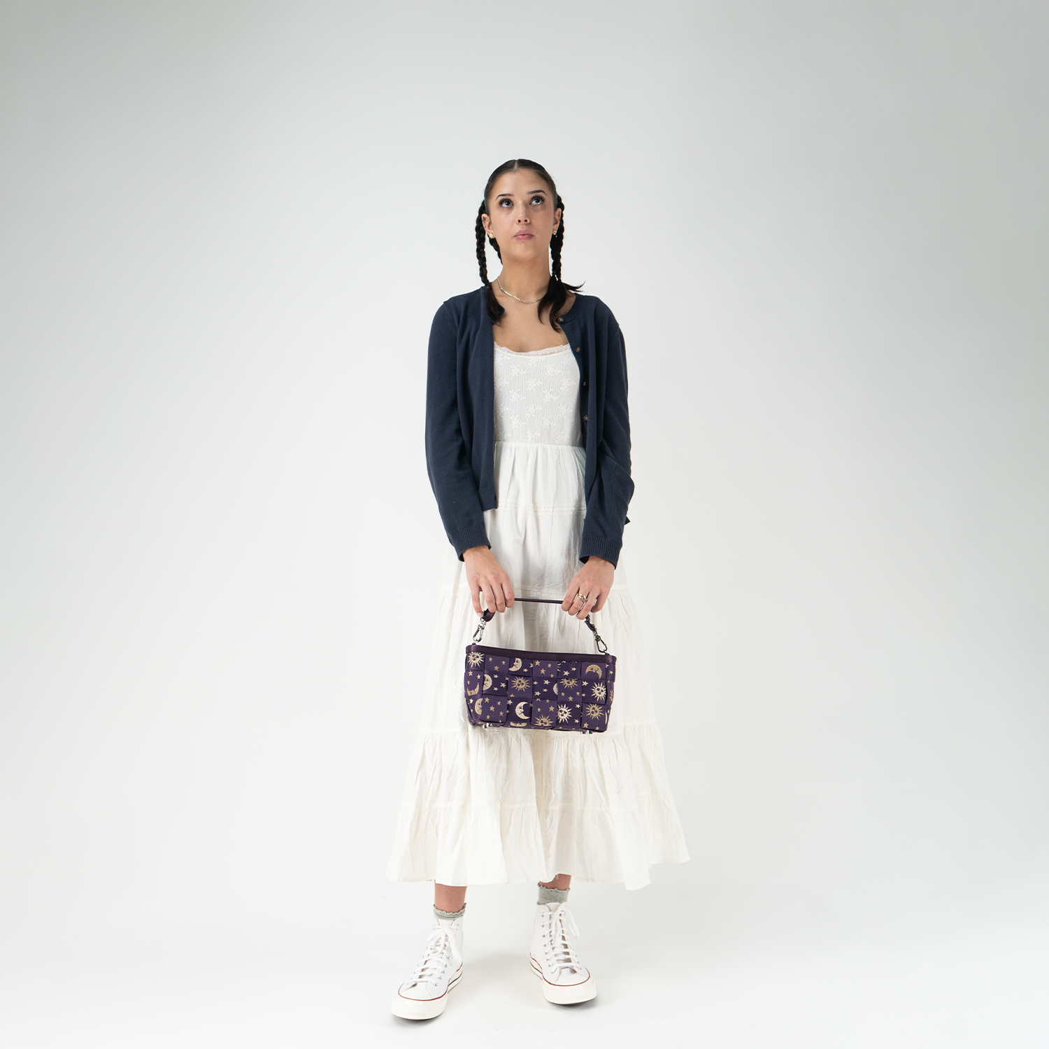 A Celestial Baguette in a models hands