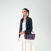 A Celestial Baguette worn on a models arm