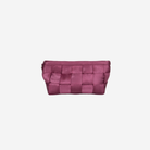 The front of a Plum Triangle Makeup Case