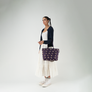 A Celestial Medium Streamline Tote on a model