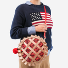 The Cherry Pie Circle Crossbody being worn by a model