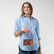 A Picnic Coin Purse being used by a model