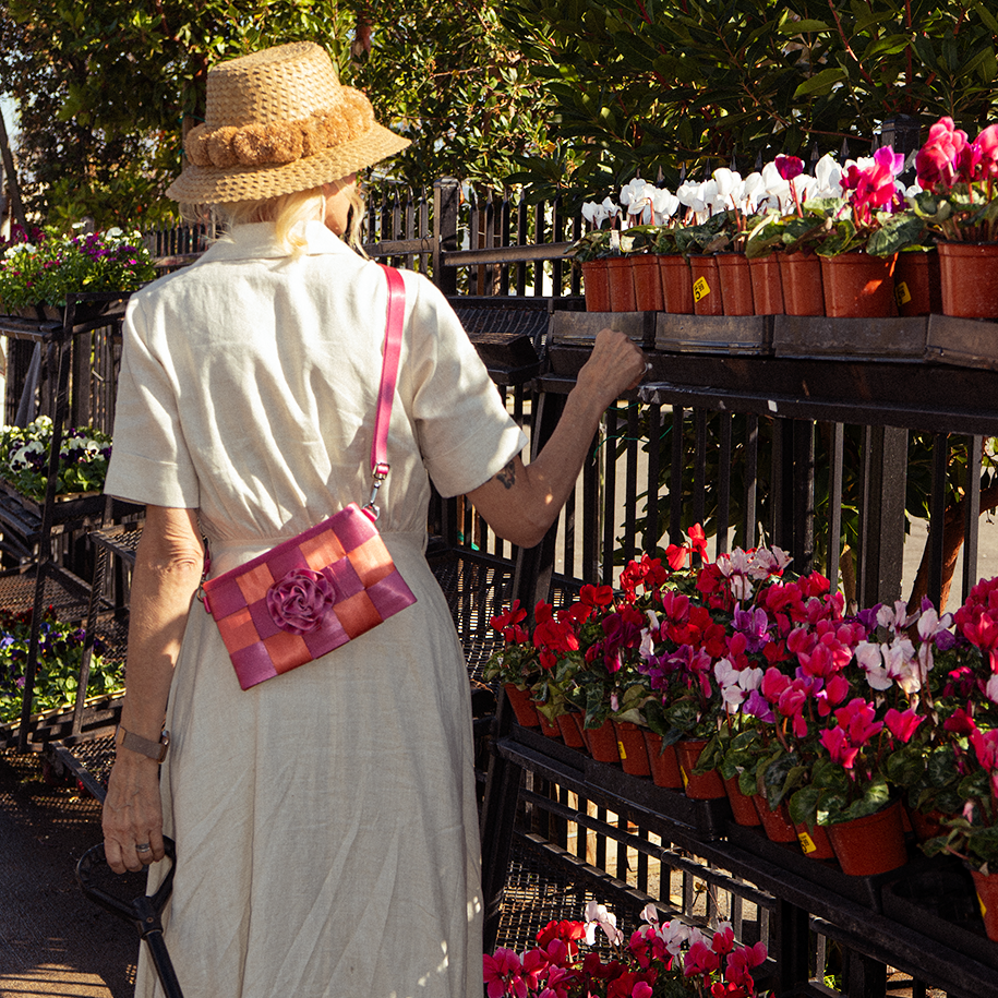 The Coral N Fuchsia Hip Pack being worn by a model