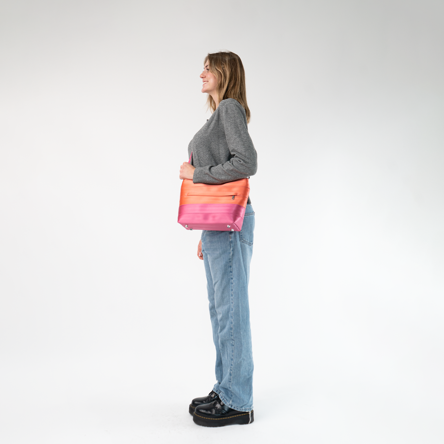 The Coral N Fuchsia Mini Streamline Tote being worn by a model