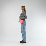 The Coral N Fuchsia Petite Tote being worn by a model